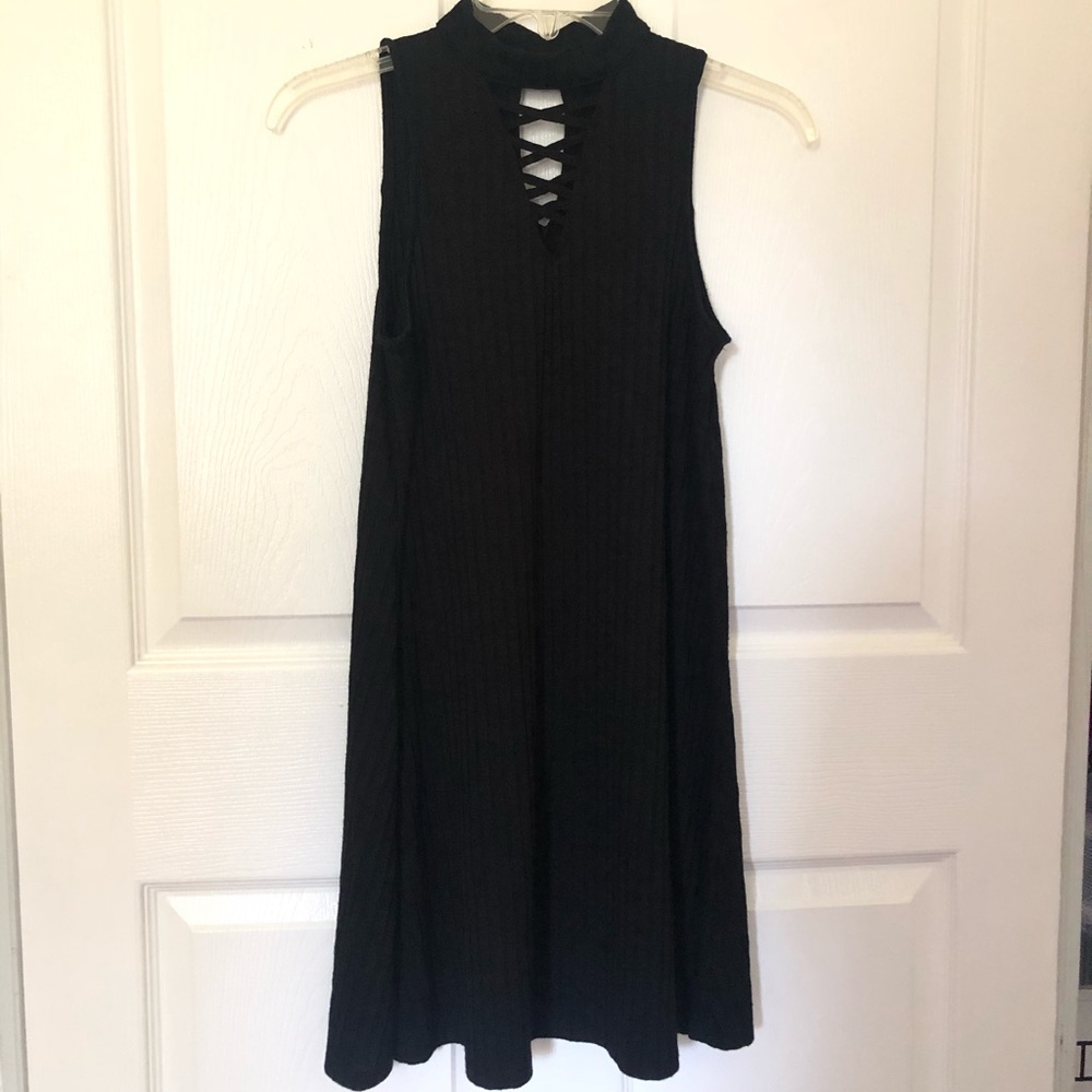 Shapeless sleeveless high neck ribbed dress